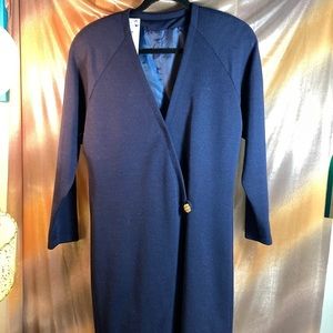 VINTAGE 90’s dark navy wool long blazer. 44” long.‎ 40” chest. 158. Tiny hole